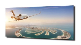 obraz na szkle Samolot nad Dubajem